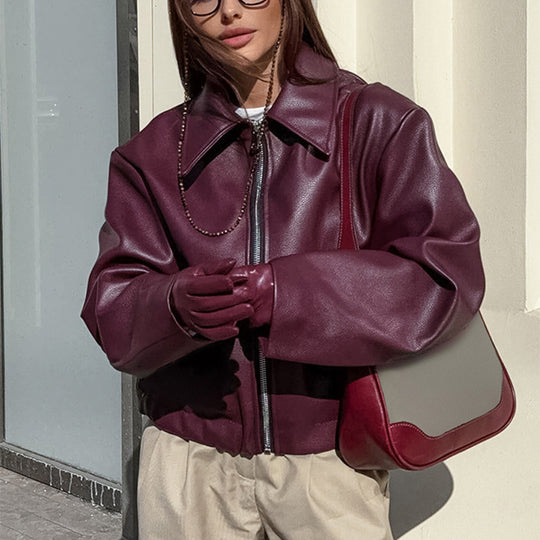Women's black zip-front lapel leather jacket by Yeha Maison, stylish outerwear with a sleek design and classic fit.