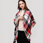 Red and black plaid women's blanket scarf by Yeha Maison, showing a large 59x59 inch cozy, woven shawl with fringed edges.