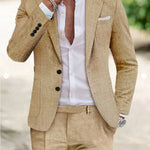 Men's textured linen two-piece suit by Yeha Maison, featuring a tailored blazer and matching trousers in a stylish, lightweight fabric.