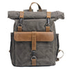 Waxed canvas roll-top backpack by Yeha Maison, durable bag with adjustable straps and multiple compartments.
