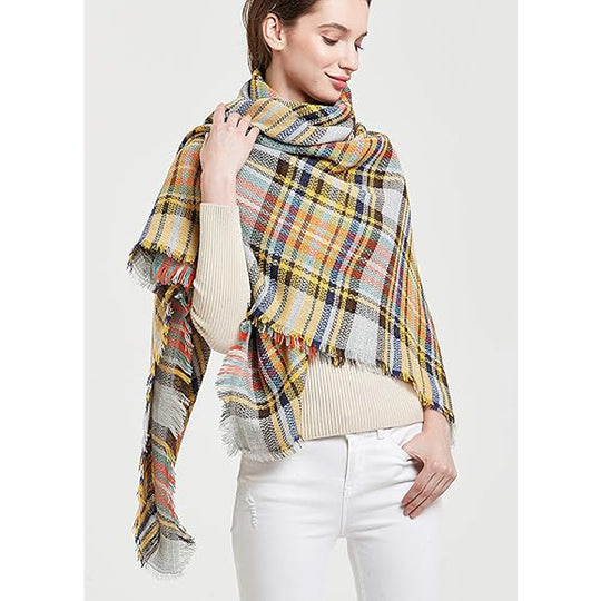Women's yellow plaid tassel blanket scarf by Yeha Maison, featuring fringed edges and cozy, warm fabric.