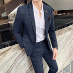 Men's plaid slim two-piece suit by Yeha Maison, featuring a tailored jacket and matching trousers in a classic pattern.