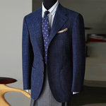 Men's slim-fit check blazer by Yeha Maison, tailored fit with classic check pattern, shown on a hanger.